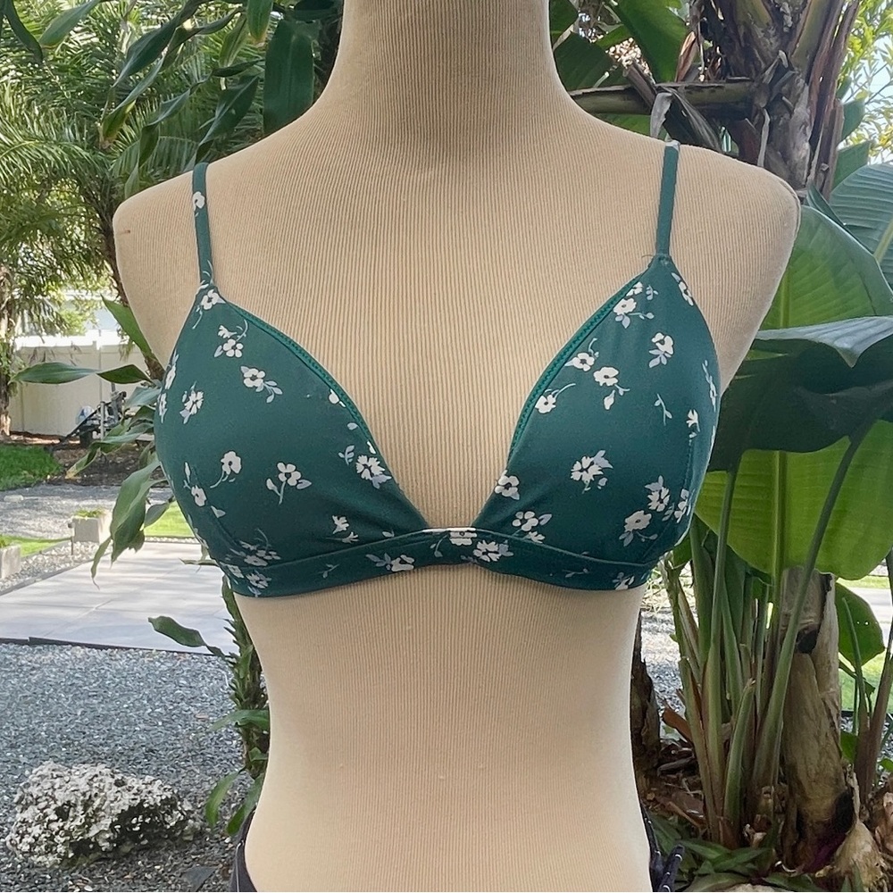 H&M Woman's new swimsuit top, Teal with white flower pattern. Gold clasps. S